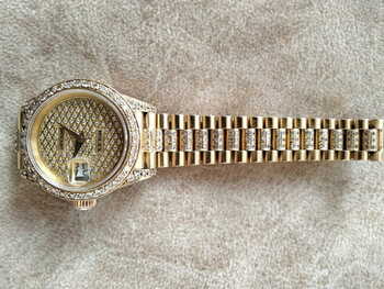 Rolex gold and diamond watch ladies